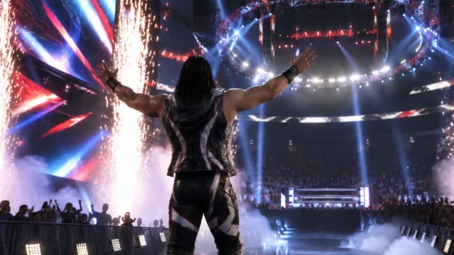 WWE 2K26 final DLC wrestler raising both arms during an arena entrance with colorful lights, sparks and smoke